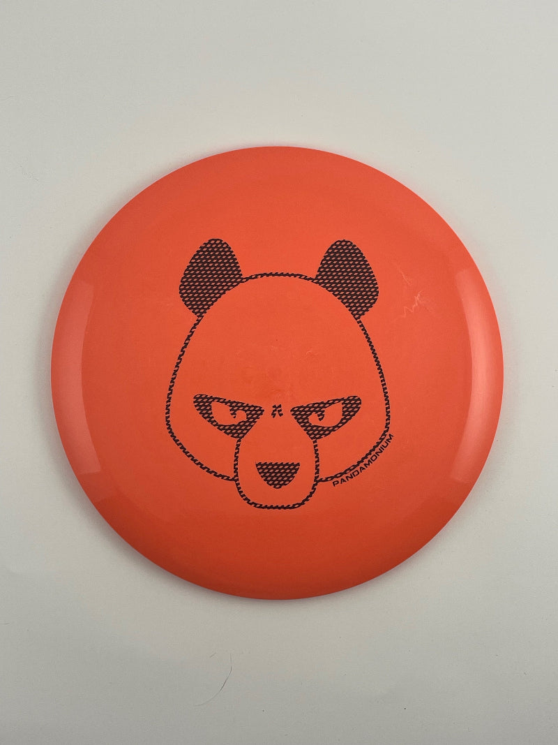Innova Valkyrie disc golf fairway driver in coral Star plastic with Pandamonium Big Panda stamp