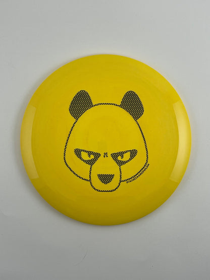 Innova Valkyrie disc golf fairway driver in yellow Star plastic with Pandamonium Big Panda stamp