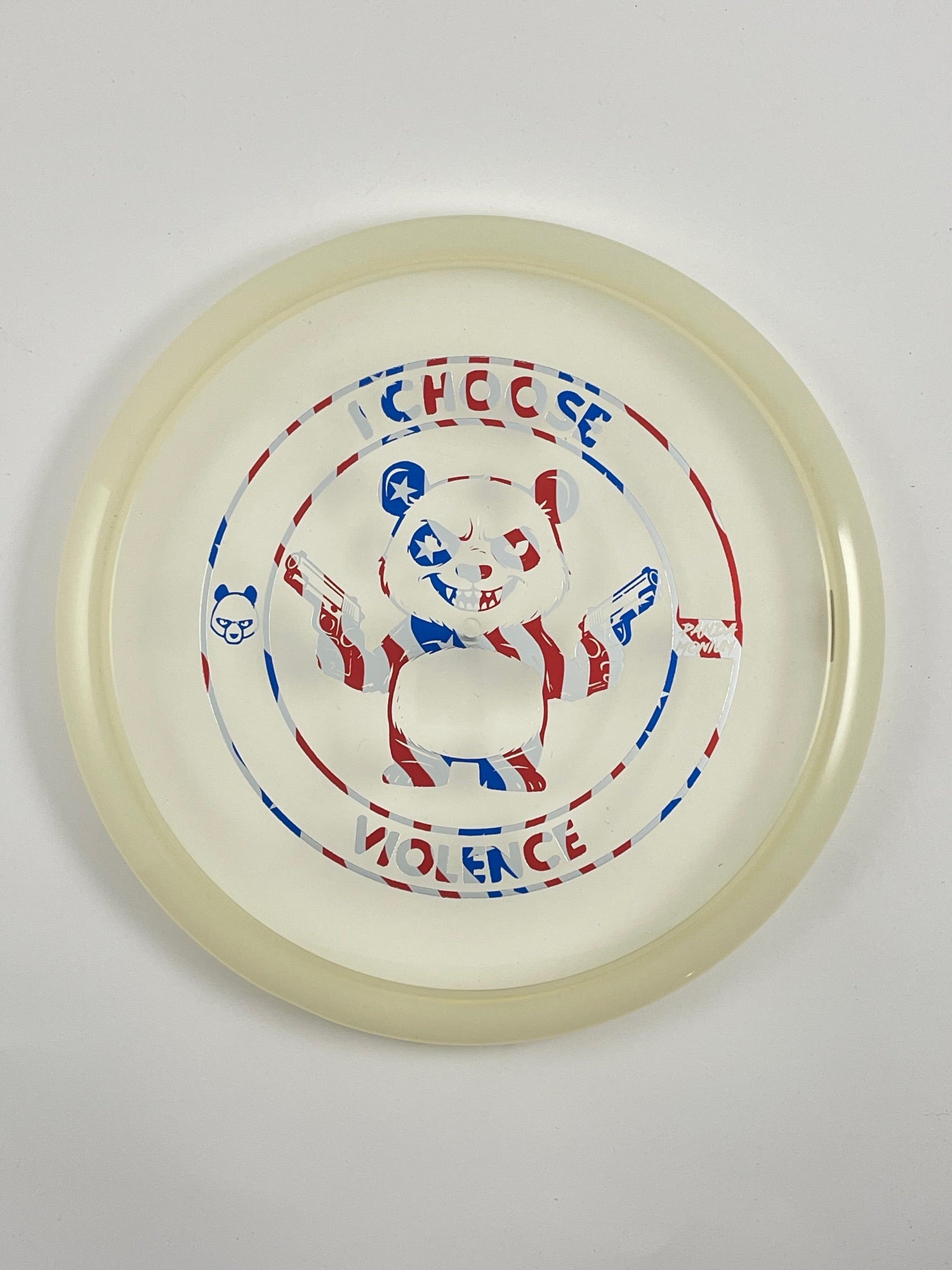 Discraft Buzzz SS disc golf midrange in clear and red Z Line plastic with Pandamonium I Choose Violence stamp